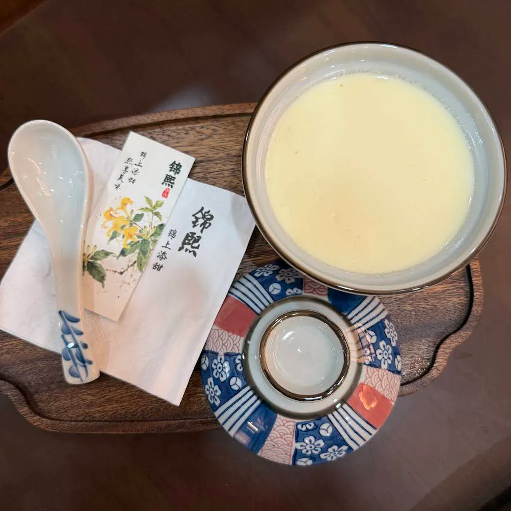 Smooth steamed egg custard in ceramic bowl